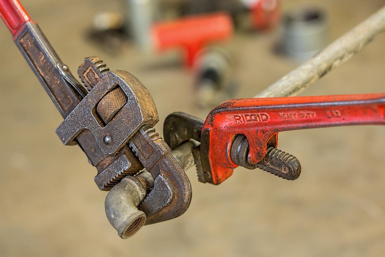 Pipe wrench and plumbing tools